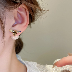 Elegant gold bee stud earrings with sparkling crystals and large pearl backings