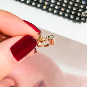 Adjustable gold screw-back earring converter with silicone pad for non-pierced ears