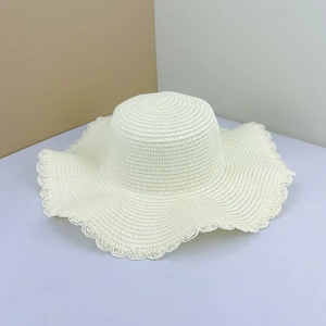 DIY wide brim straw sun hat in cream white with elegant wavy scalloped edge detail