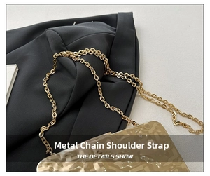 Detail of the high-quality gold hardware chain strap and textured metallic gold evening bag