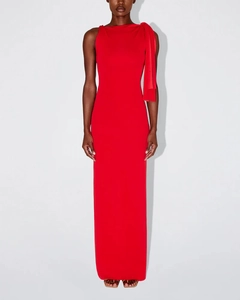 Detail of red slim-fit maxi dress featuring an elegant shoulder ribbon and neck drape