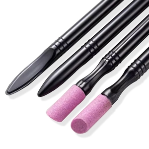 Close-up of professional quartz nail buffers and cuticle pushers for nail care