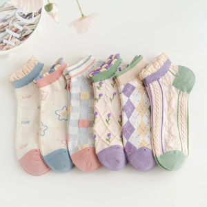 Pastel floral cotton socks with ruffle trim and patterned knit in assorted colors