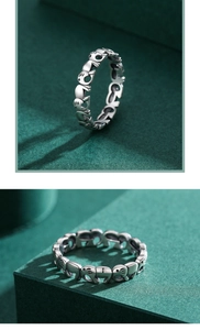Macro shot of S925 sterling silver ring featuring a continuous vintage elephant pattern