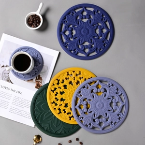 Hollow-out floral heat resistant silicone placemats in multiple vibrant colors