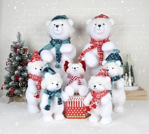 Christmas flocked white bear decorations in various sizes with festive hats and scarves