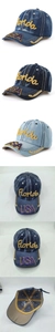 Detail view of denim baseball caps with Florida embroidery and USA rhinestone letters
