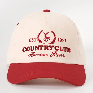 Vintage baseball cap with reindeer embroidery and EST 1991 text in cream and red
