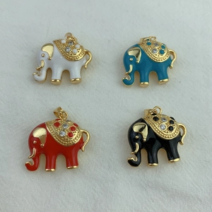 Detailed close-up of four colorful enamel elephant charms with rhinestones in 2x2 grid