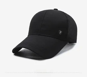 Detail of black breathable mesh baseball cap featuring silver shield F logo on the side