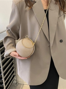 Elegant sphere-shaped evening bag with champagne glitter finish and metal chain strap