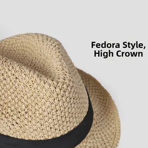 Close-up of woven straw texture and black ribbon detail on a vintage jazz style sun hat