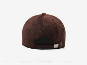 Detail view of the brown corduroy baseball cap back with adjustable metal buckle closure
