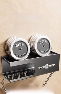 Detail of matte black wall-mounted metal storage rack showing strong 10kg load capacity