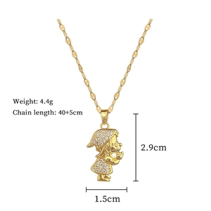 Detail view of gold prayer girl pendant with dimensions 2.9cm by 1.5cm and chain specs