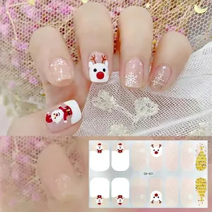Close-up of CS-421 Christmas nail stickers with Santa, elk, and glitter tree patterns