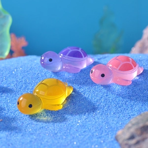 Tre graziose tartarughe luminose in resina per decorazione acquario in giallo rosa viola