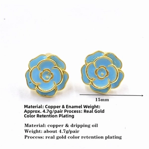Detail view of 15mm blue enamel rose studs with gold plating and copper material