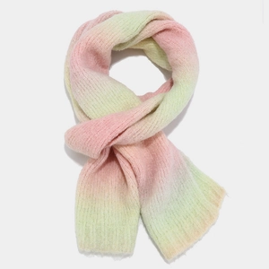 Detail of pink and green gradient knit scarf featuring soft woolen texture and fine stitching
