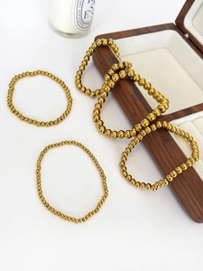 Bracciali con perle in acciaio inossidabile placcato oro 18K lucido di varie misure