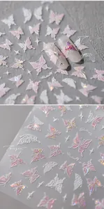 Macro detail of 3D iridescent butterfly nail stickers with pearlescent gradient textures