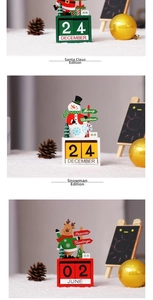 Three Christmas wooden desk calendars with Santa, Snowman and Reindeer cartoon figures