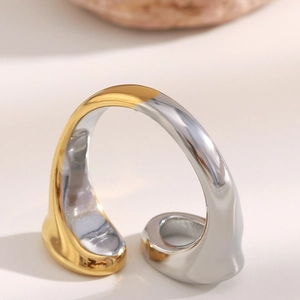 Macro shot of two-tone 18K gold plated stainless steel ring with polished finish