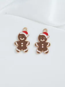Detailed pair of Christmas gingerbread man charms with gold plating and oil drop process