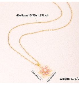 Detail shot of a pink floral zircon pendant necklace with precise size measurements