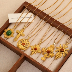 Vintage stainless steel tiger eye necklaces with various gold-plated sun and cross pendants