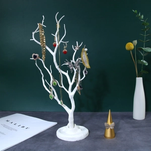 White branch-shaped jewelry stand with stable base for necklaces and rings