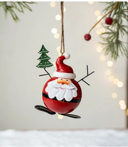 Detailed view of creative metal Santa Claus skiing ornament on a pine branch