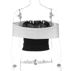 Back view of a cropped black and white tube top featuring a minimalist color-block design