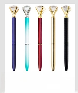 Detailed row of metal diamond pens in purple, teal, red, gold, and black finishes