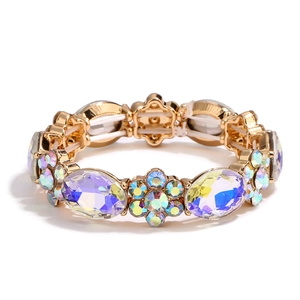 Bohemian gold stretch bracelet with large oval purple crystals and floral rhinestones