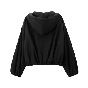 Back view of a casual black hooded jacket with smooth fabric and relaxed fit for women