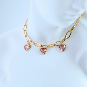 Classic 18K gold plated stainless steel chain necklace with three pink heart pendants