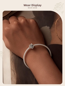 Elegant s925 silver mesh bracelet with 3D rose flower charm worn on a female wrist