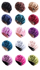 Collection of 15 colorful satin bonnets with adjustable buckles in a matrix layout