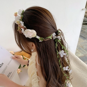 Elegant white floral wreath headband for women with long tassels and greenery