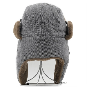 Winter herringbone trapper hat with brown faux fur lining and ear flaps for men