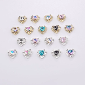 Detailed view of colorful heart-shaped rhinestones with alloy bases for DIY nail art design