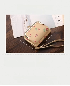 Detailed size chart of beige card holder with cherry print showing 11.1x8x2.5 cm dimensions