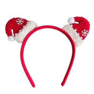 Cute Christmas headband featuring red plush Santa hats with silver snowflakes and pearls