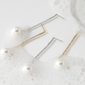 Elegant long tassel pearl earrings with sparkling zircon accents in gold and silver finish