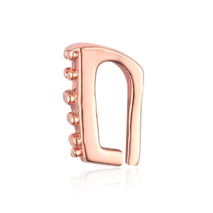 Detailed view of D-shaped rose gold ear cuff with decorative metal beads on white background