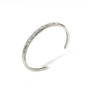 Polished stainless steel cuff bracelet with star patterns and zircon inlay on white background