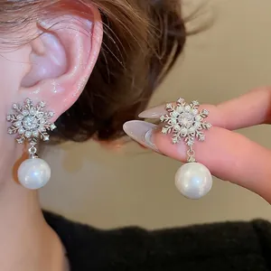 Elegant silver snowflake earrings with pearls and zircon stones for women's daily wear