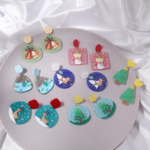Cute acrylic Christmas earrings set with cartoon reindeer, trees and festive patterns