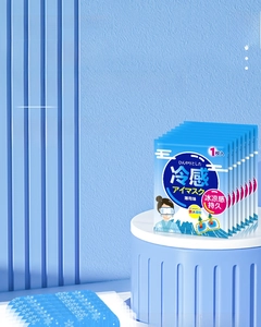 Macro view of cooling ice eye mask packaging with mint scent and snowflake design